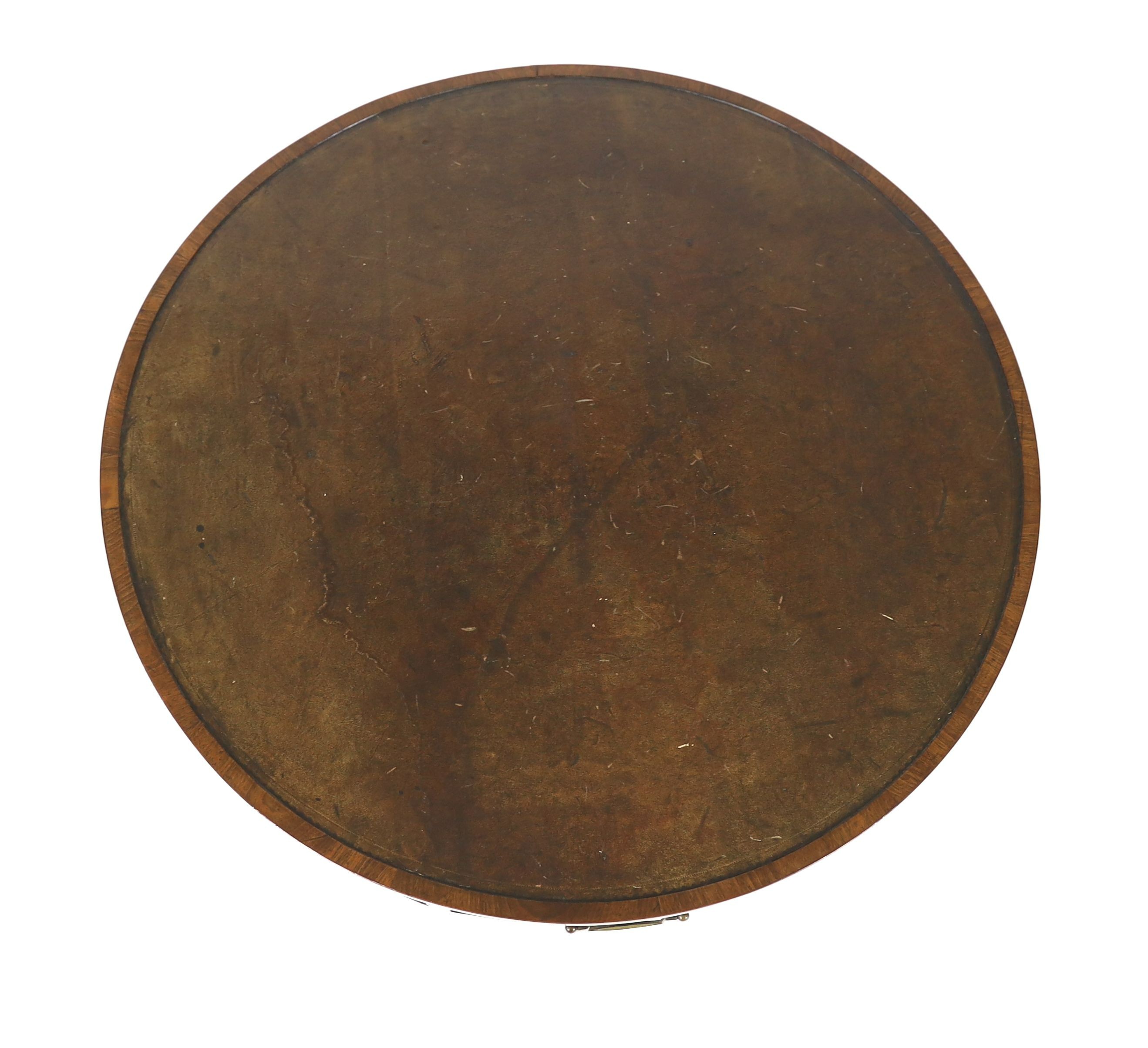 A George III mahogany drum top table, diameter 86cm H.74cm